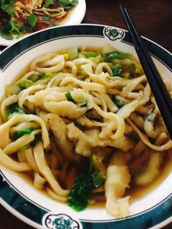 Qi Xin Mian Guan